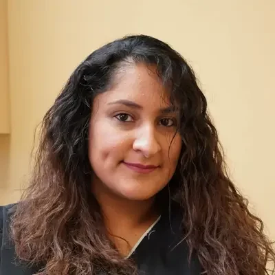A headshot photo of Sandra